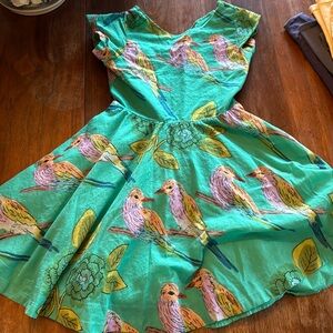 Adorable dress, with keyhole back and flare bottom for girls who love to spin.